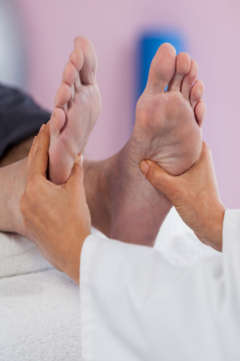 reflexology on a man's foot