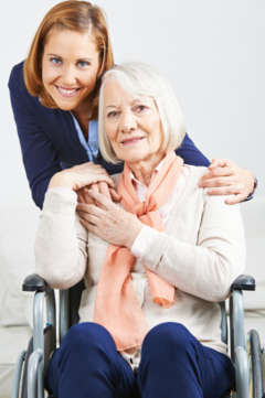 nurse with patient in wheelchair 