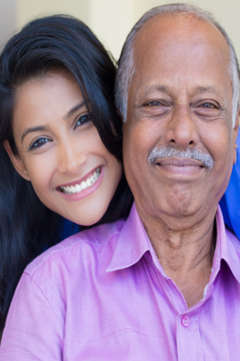 smiling woman with her father 