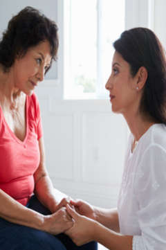 woman caring for her mother with dementia