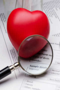 rubber heart and magnifying glass