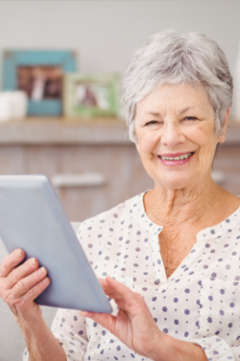 older woman using a tablet 