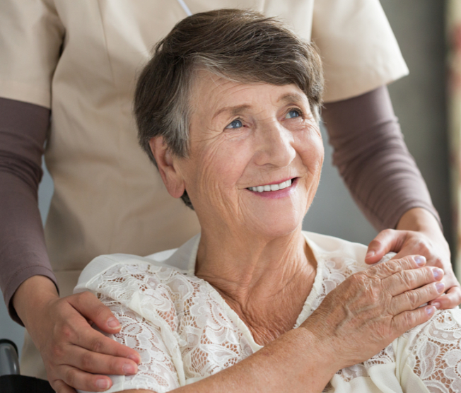 woman in wheelchair smiling