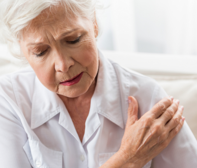 older woman with joint pain