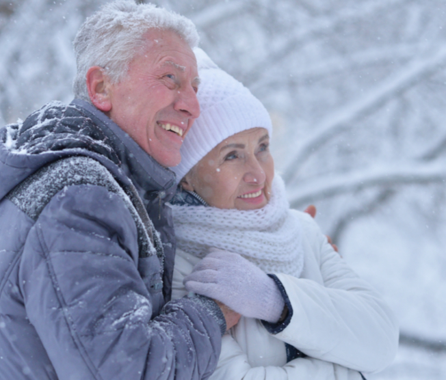 senior couple in the snow