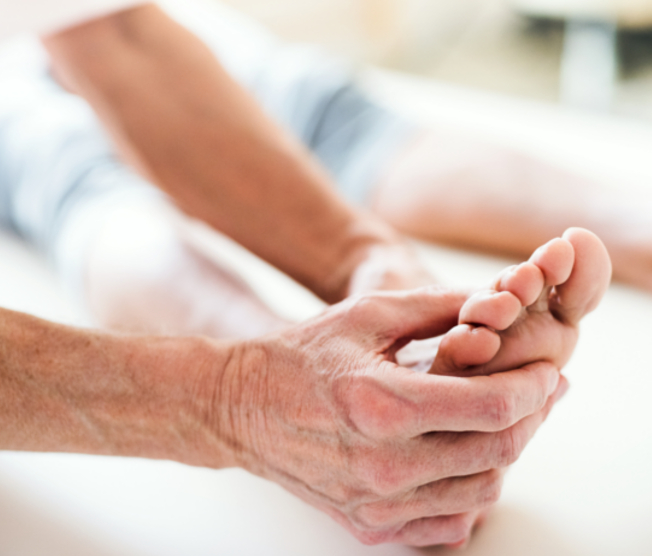 podiatrist working on foot