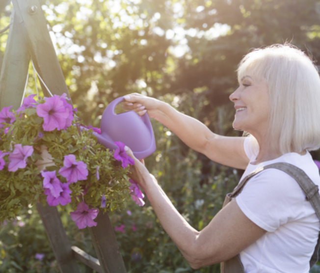woman watering flowers