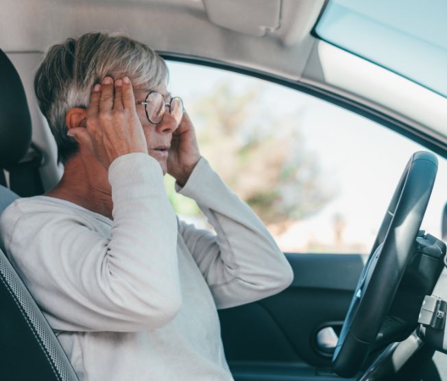 senior woman driving car